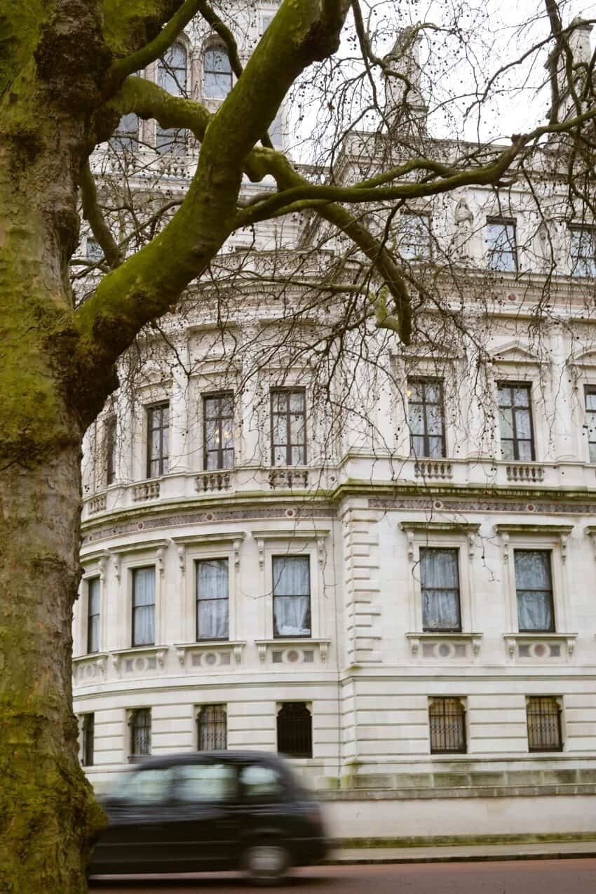 A London Black Cab captured zooming by the Churchill War Rooms along Horse Guards Road.