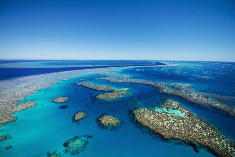The incredible landscape of the Great Barrier Reef photographed from a helicopter.