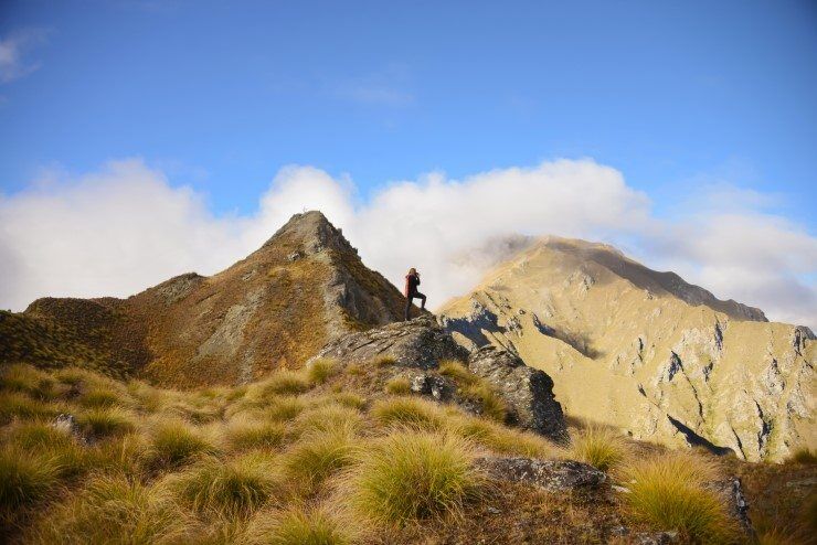 Photographing atop Roy's Peak.