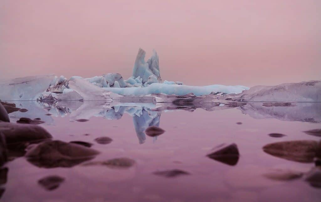 Midnight sun over Jokulsarlon iceberg available as Framed Prints