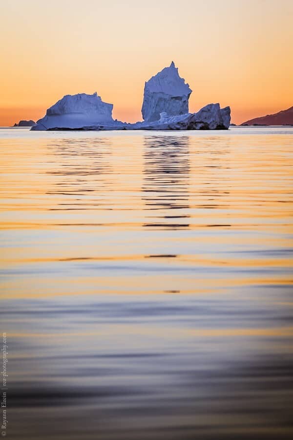 Iceberg and evening light in Uummannaq in West Greenland